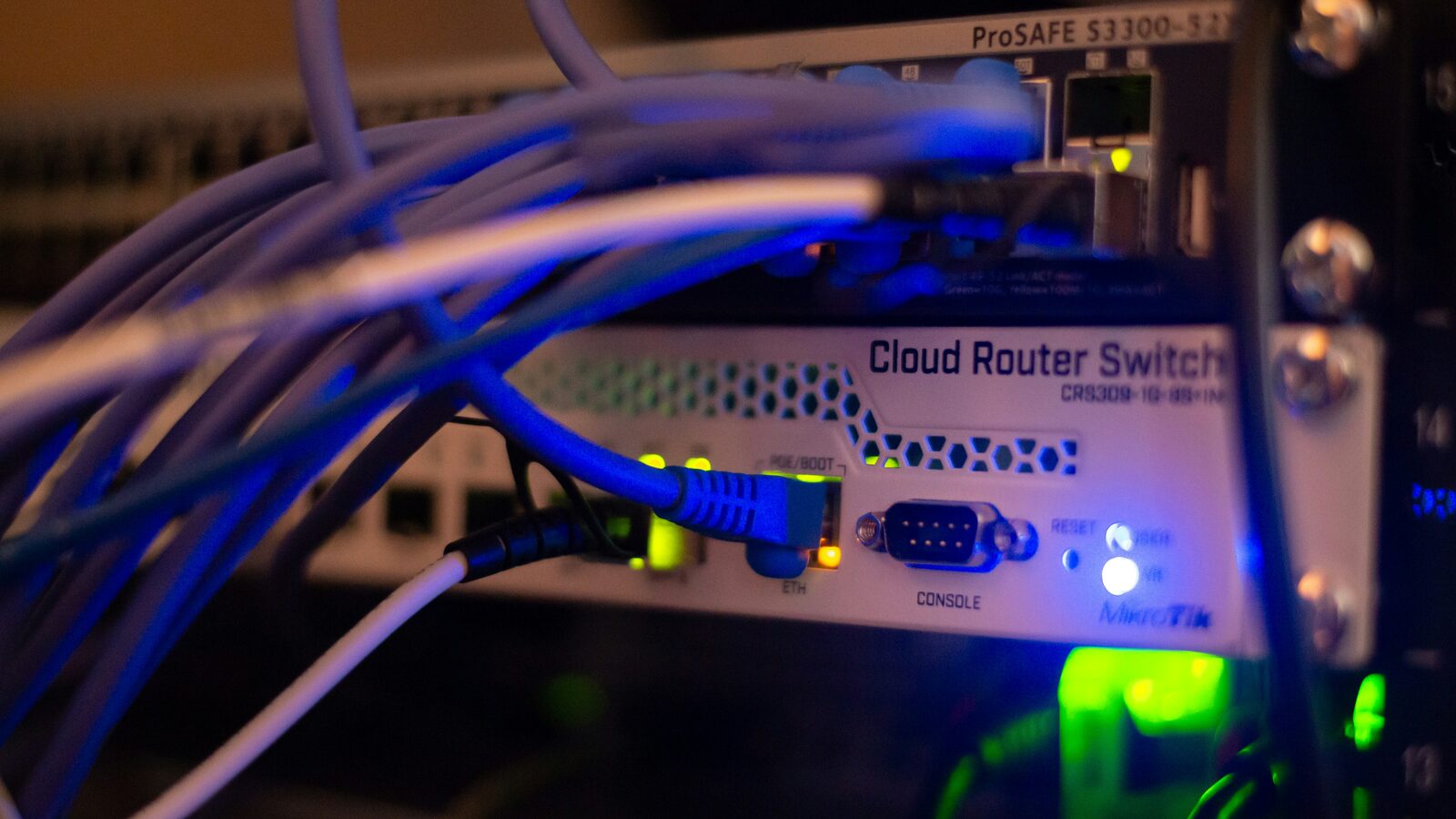 Close-up of network cabling connected to infrastructure equipment